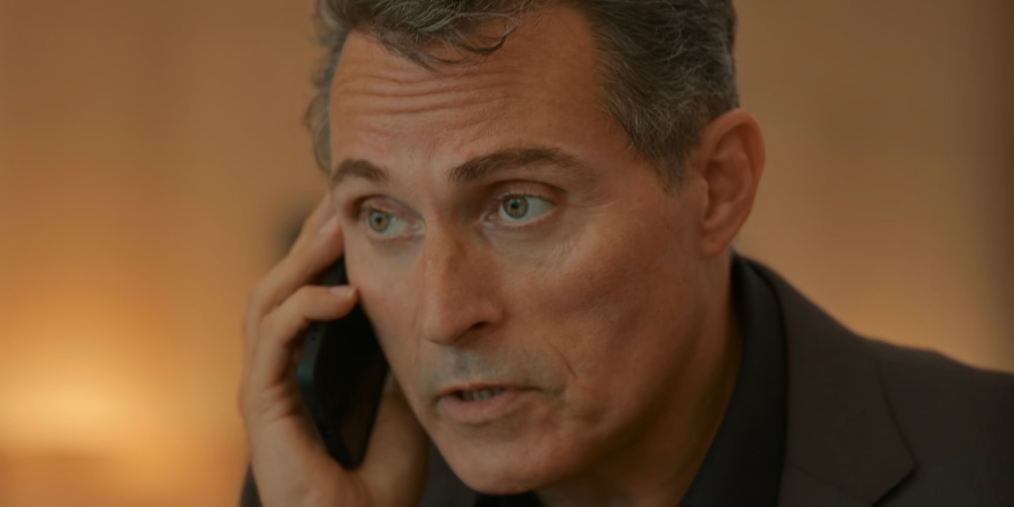 Rufus Sewell on the phone as Hal Wyler in The Diplomat