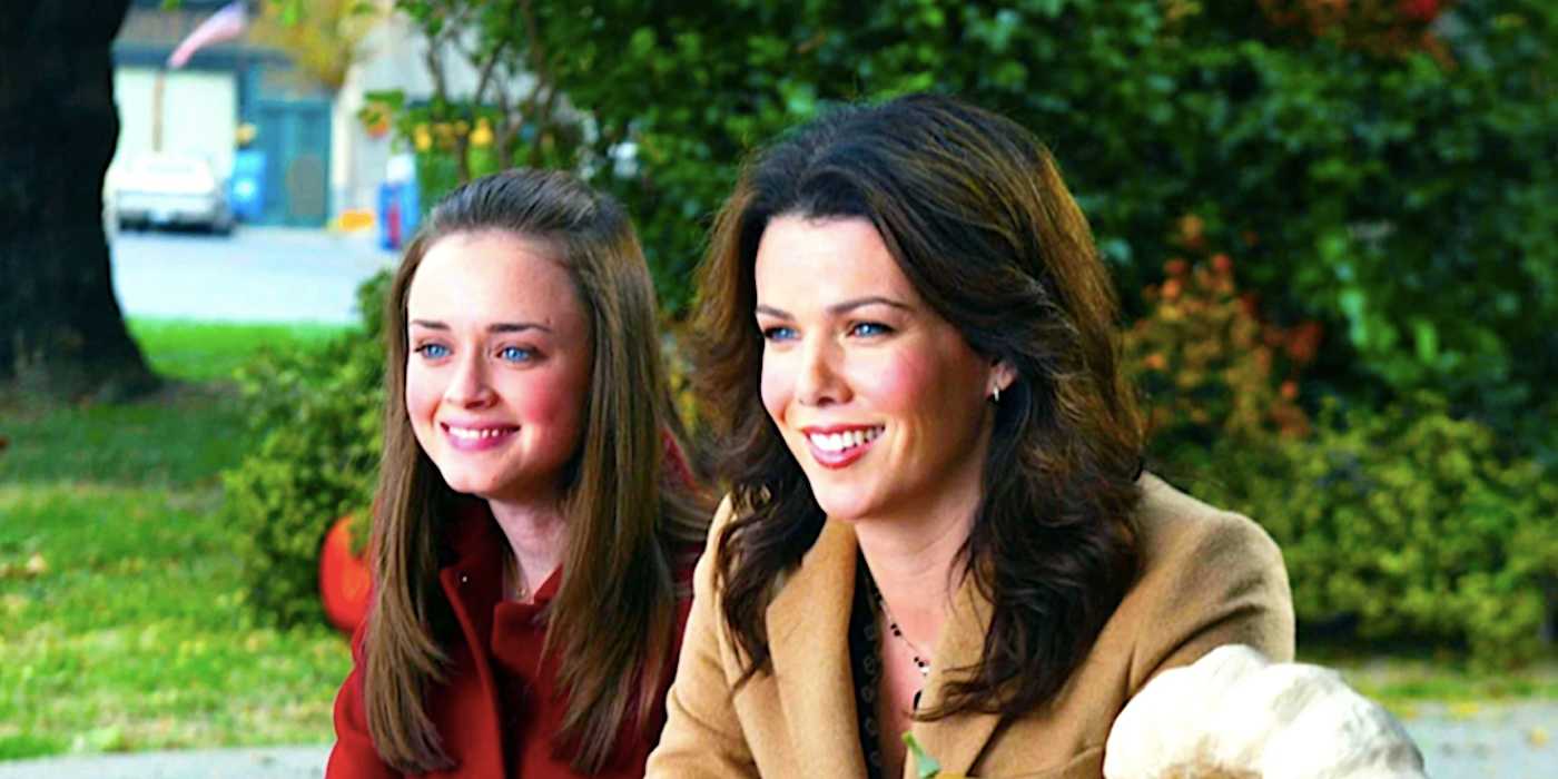 alexis-bledel-s-rory-and-lauren-graham-s-lorelai-sit-smiling-at-a-picnic-table-in-gilmore-girls-season-3 New Gilmore Girls Release With OG Cast Officially Premieres In Just 2 Weeks