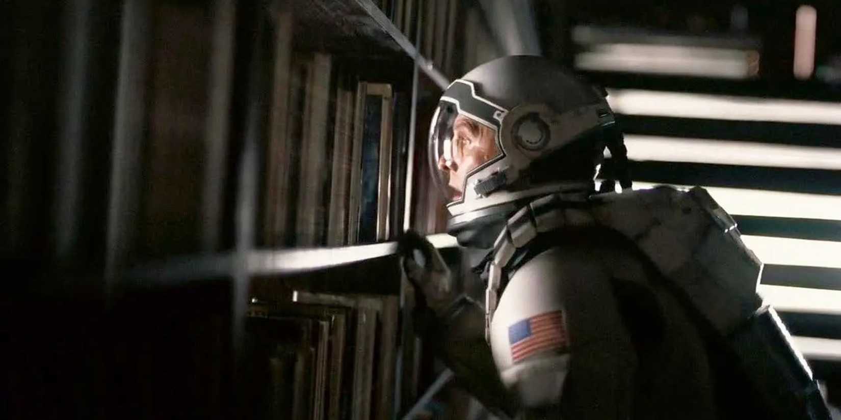 Coop behind Murph's bookcase in Interstellar
