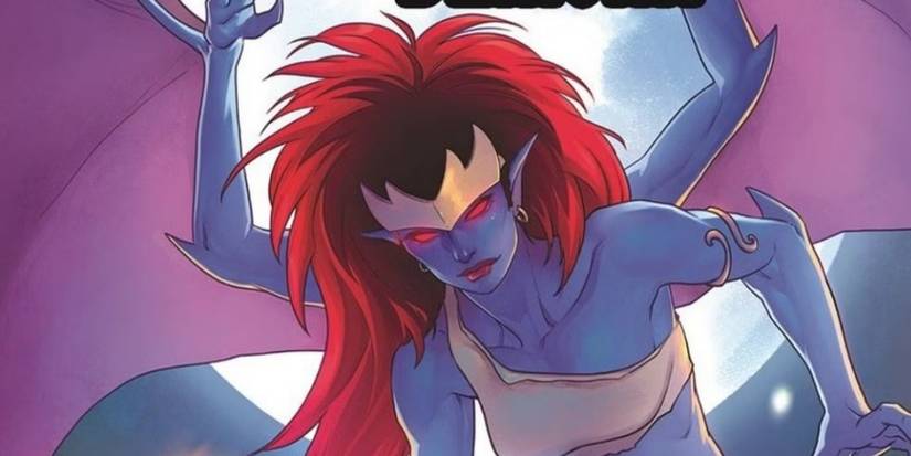 A close-up of Demona from Gargoyles, her red hair long and her eyes glowing red. 