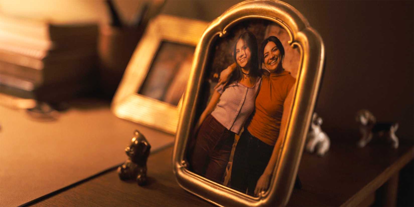 A framed photograph of Gina and Camille Pickett in Tracker season 2