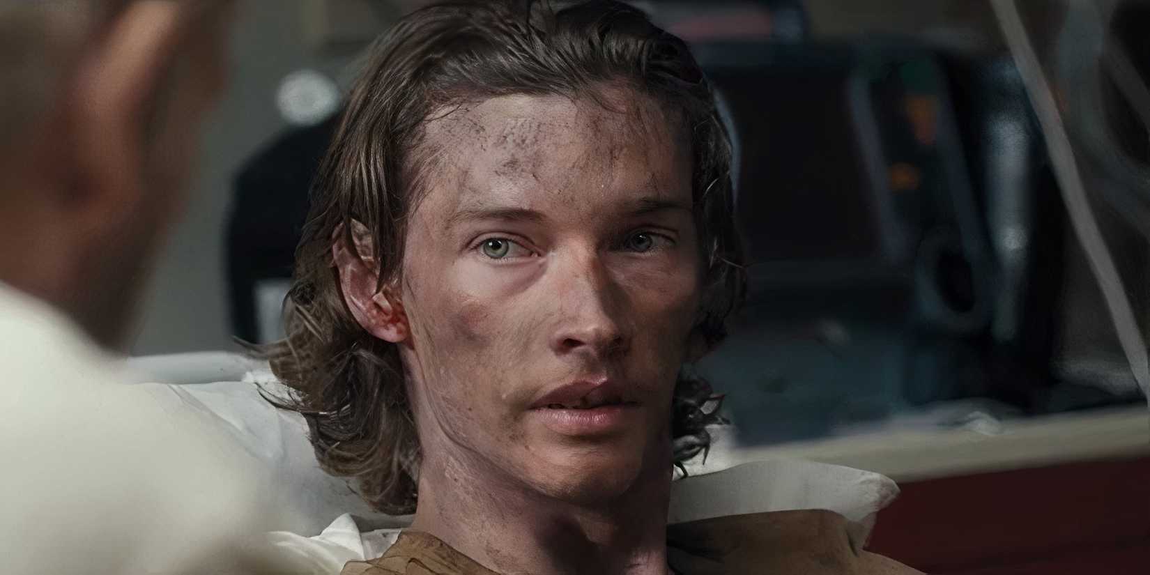 Jacob Lofland as Cooper looking concerned in Landman episode 2