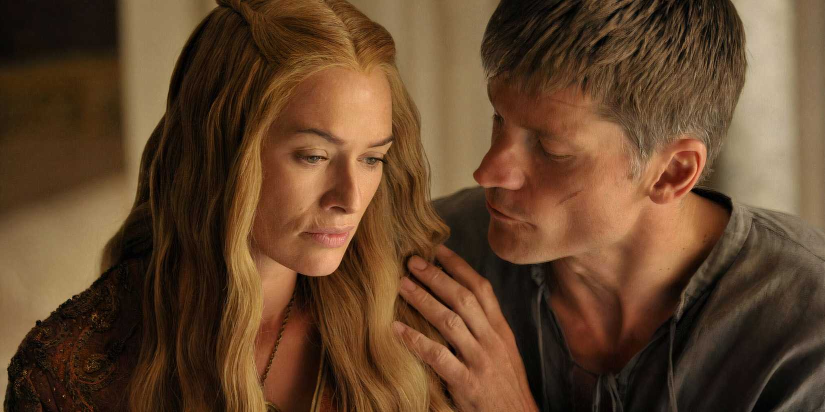Jaime Lannister (Nikolaj Coster-Waldau) holding Cersei (Lena Headey) in Game of Thrones