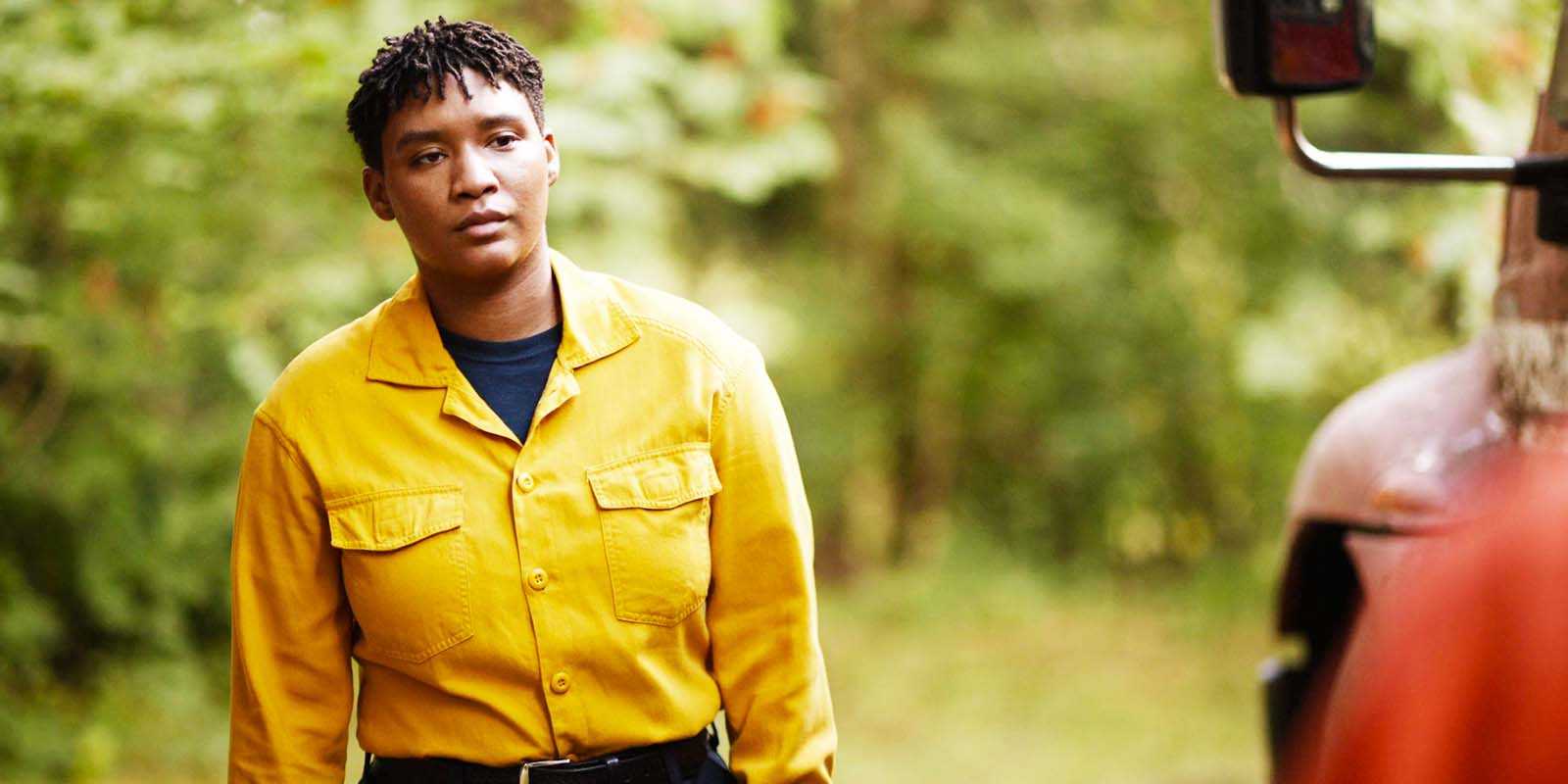Jules Latimer as Eve Edwards looking concerned in a yellow shirt in Fire Country season 3, episode 3
