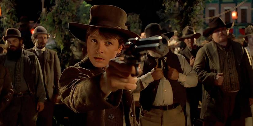 Marty McFly aiming a gun in Back to the Future III