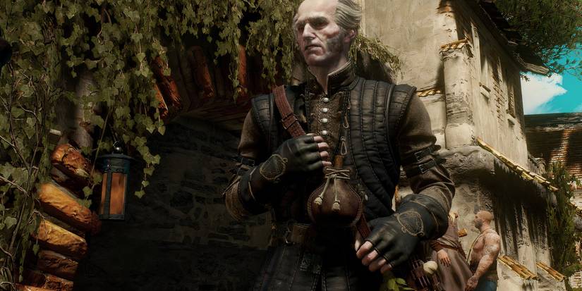 Regis holding a satchel in The Witcher video games