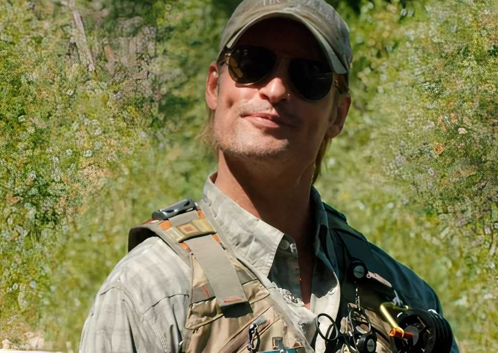 Roarke Carter (Josh Holloway) smiling while fly fishing in Yellowstone