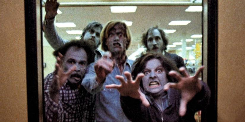 A hoard of Romero's classic zombies reach through an elevator door in Dawn of the ᴅᴇᴀᴅ (1978).