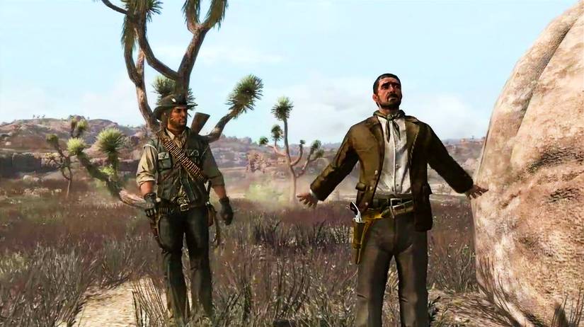 Sam Odessa with arms outstretched, monologuing to John in the desert from RDR1.