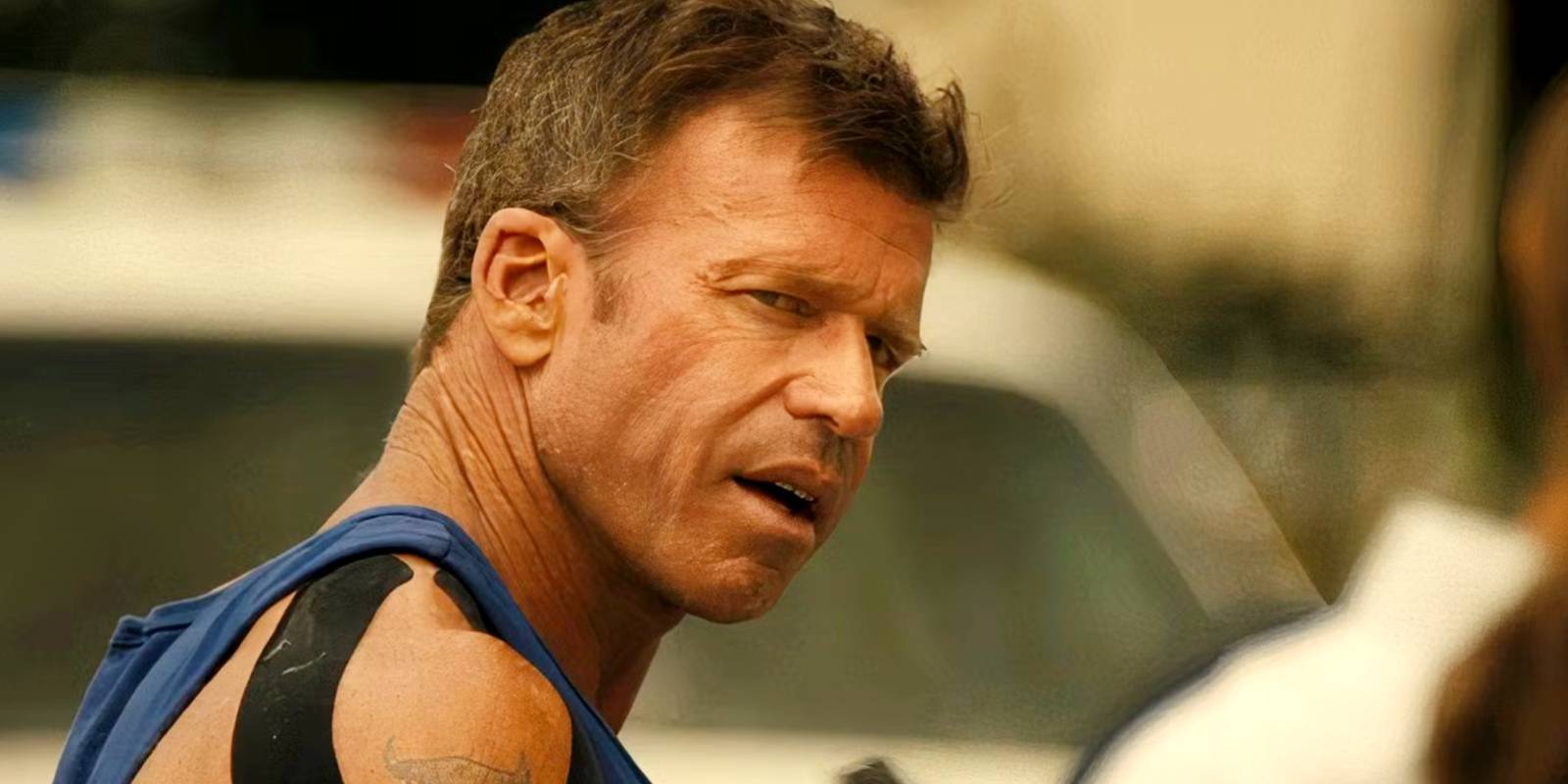 Taylor Sheridan looking over his shoulder as Cody Spears in Lioness season 2