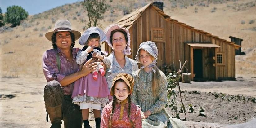 The Ingalls family in front of their homestead in Little House on the Prairie