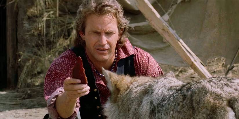 Dances With Wolves offers a wolf some meat