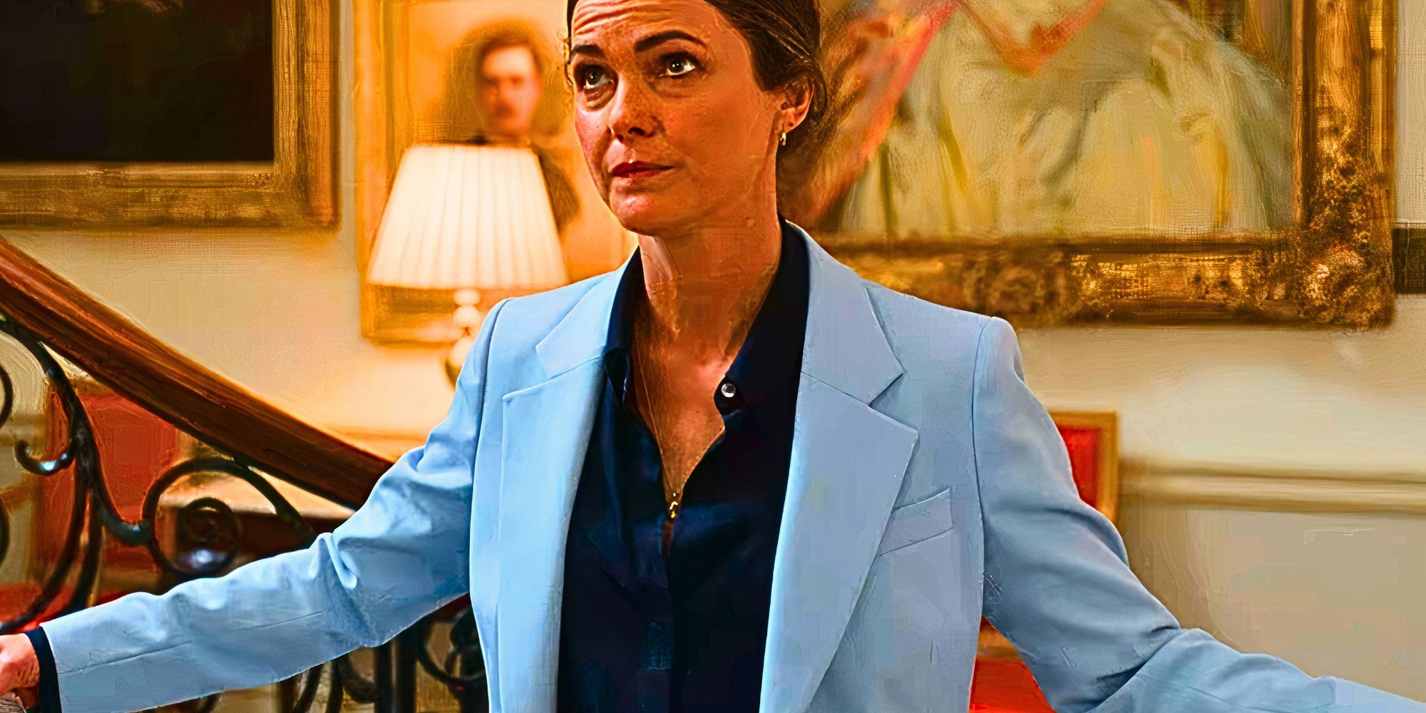 Keri Russell as Kate Wyler with her arms open wide looking inquisitive in The Diplomat