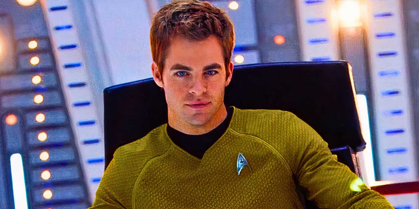 Chris Pine as Captain Kirk sitting on the Enterprise in Star Trek 2009