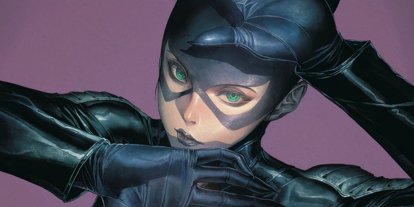 Comic book art: a close up of Catwoman in her mask, holding her hands in front of her face.