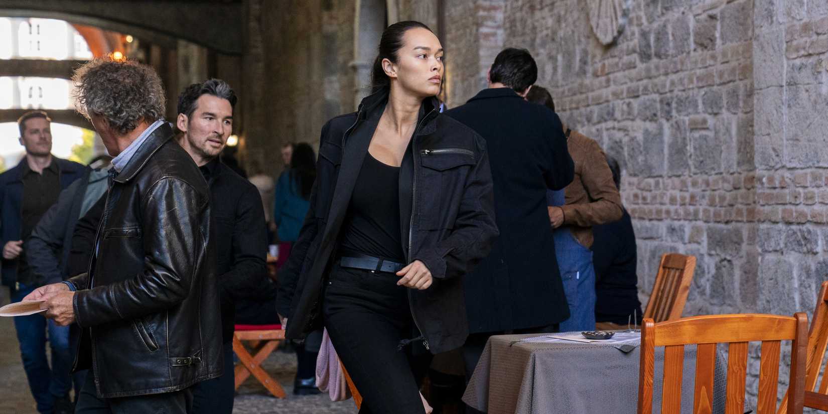 Vo and Booth running in FBI: International season 4, episode 7