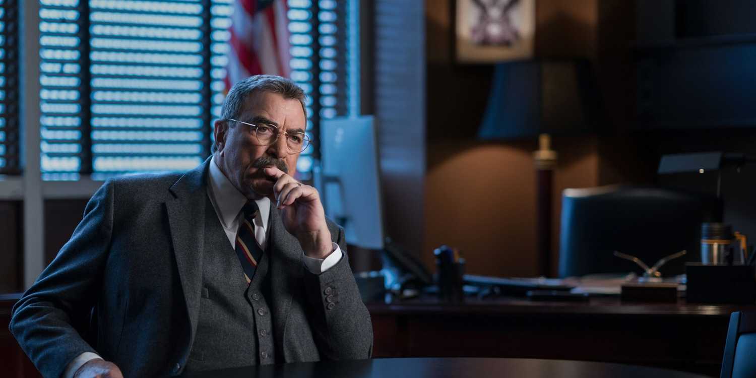 Blue Bloods Frank sitting at his desk and thinking