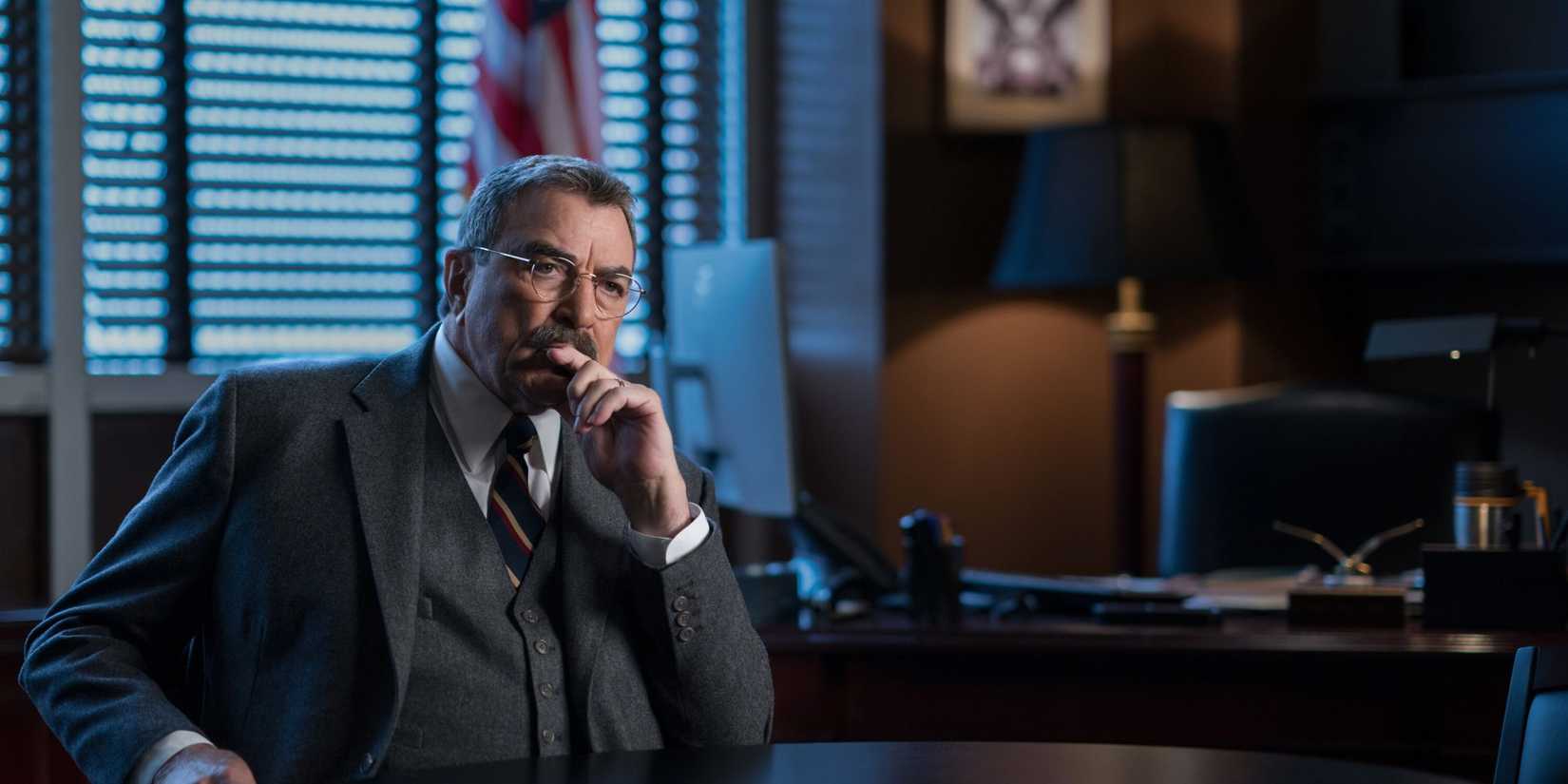 Blue Bloods Frank sitting at his desk and thinking