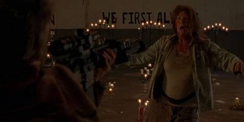 Carol holds Mary at gunpoint in The Walking Dead