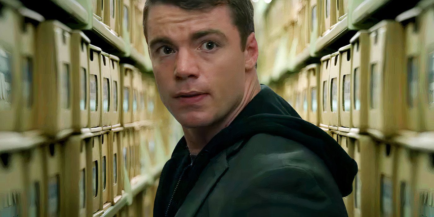 Gabriel Basso as Peter Sutherland from The Night Agent season 2 in an aisle full of files