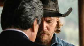 Gil Birmingham as Chief Thomas Rainwater and Luke Grimes as Kayce Dutton in Yellowstone season 5 episode 14