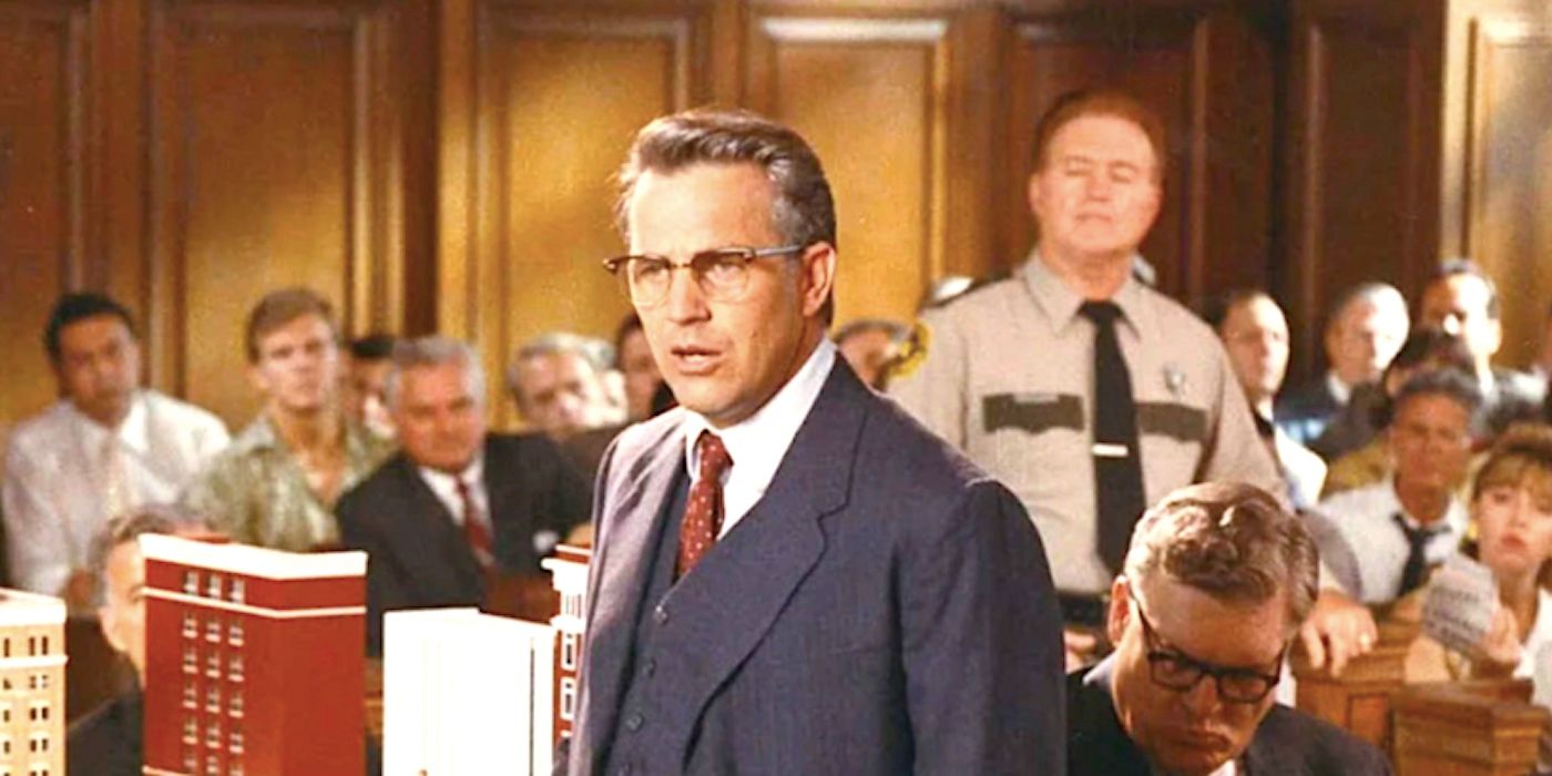 https://static0.srcdn.com/wordpress/wp-content/uploads/2024/12/kevin-costner-s-jim-garrison-stands-in-a-packed-courtroom-in-jfk-1991.jpg