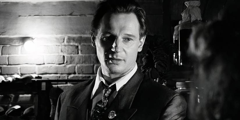 Liam Neeson speaking with one of the Jewish characters in Schindler's List