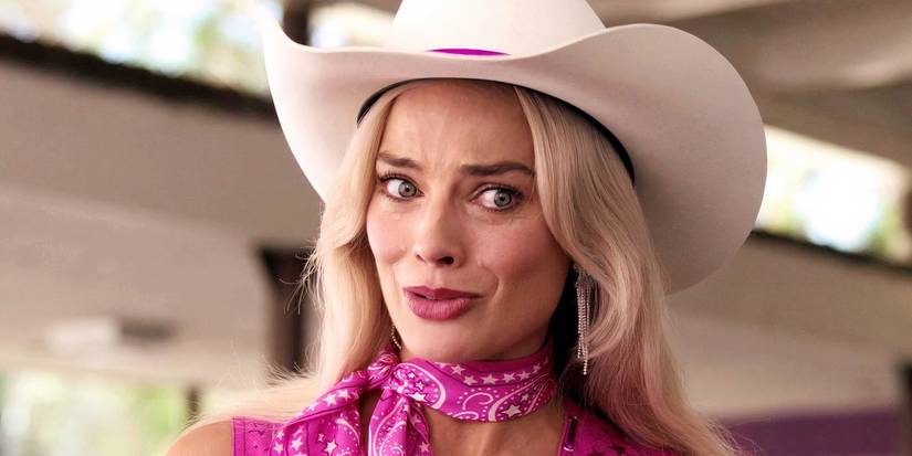 Margot Robbie as Barbie crying in the cafeteria in Barbie