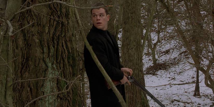 Matt Damon reloading a shotgun as Jason Bourne in The Bourne Identity