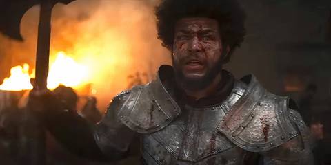 Perrin Aybara covered in blood in a battle in The Wheel of Time
