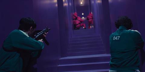 Players O47 and 015 trying to attack the guards from behind in Squid Game season 2's finale