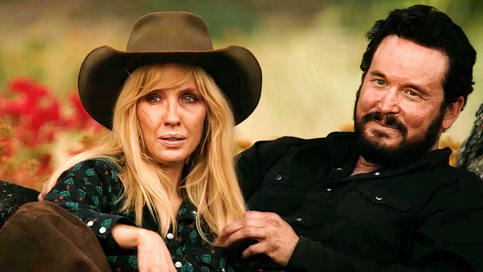 Rip and Beth smiling and watching from the sideline in Yellowstone