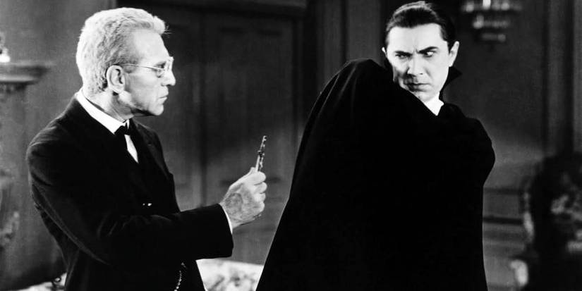 Bela Lugosi's Dracula recoils from a cross