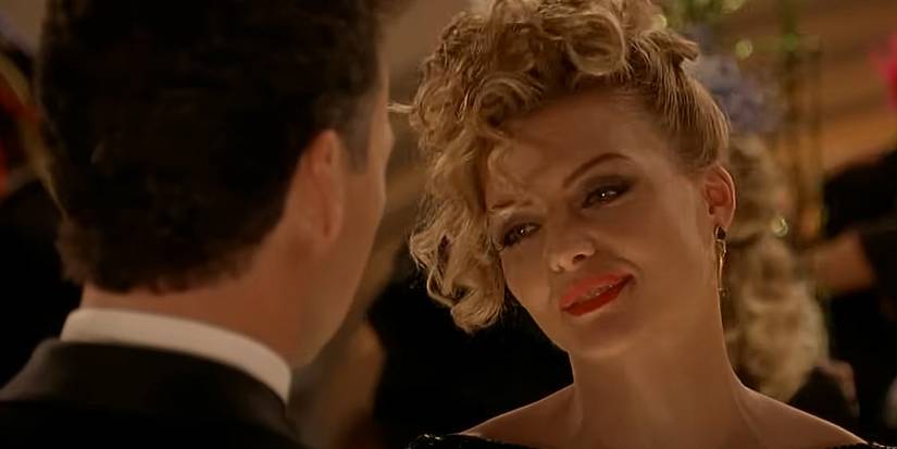 selina catwoman talking to bruce wayne in batman returns