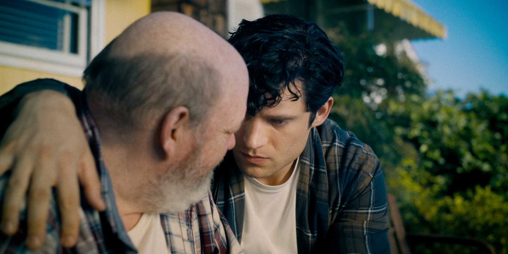 Jonathan Kent and Clark hugging in Superman (2025)