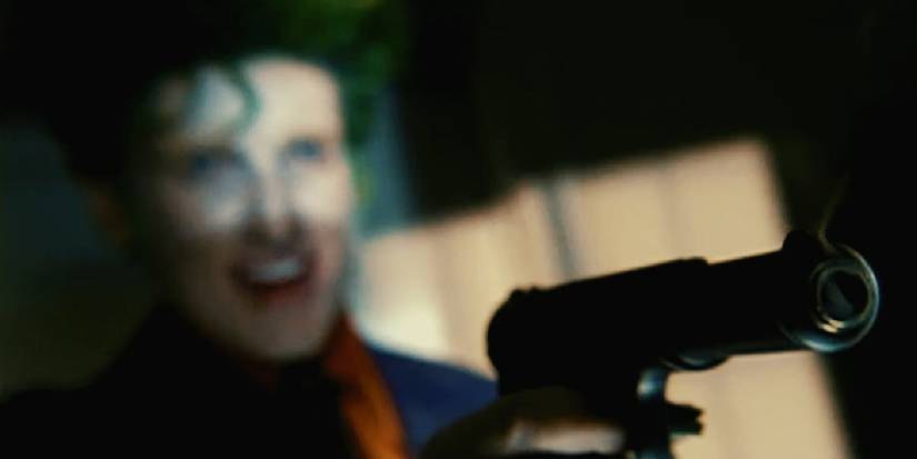 The Joker shoots Barbara Gordon in the Birds of Prey show's adaptation of Batman The Killing Joke