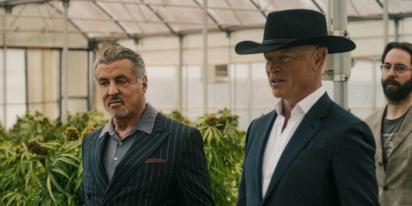 Sylvester Stallone's Dwight looking uneasy talking with Neal McDonough's Cal in Tulsa King season 2