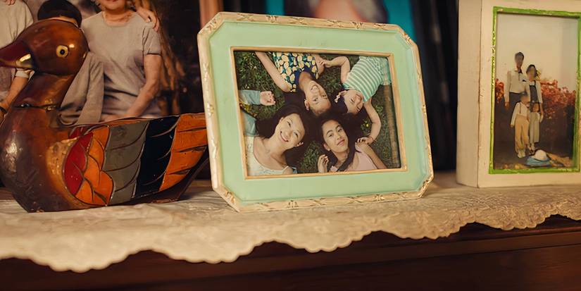 Picture frame showing Kitty, Margot, Lara Jean, and Eve Song from XO, Kitty Season 2