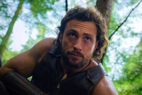 Aaron Taylor-Johnson as Kraven looking offscreen