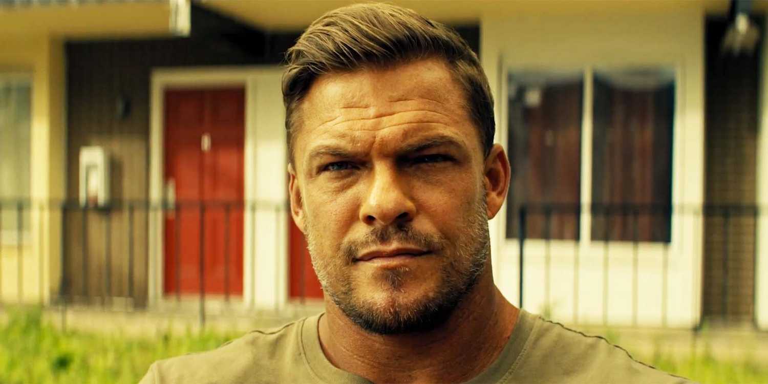 Alan Ritchson looking serious as Reacher in Reacher season 3