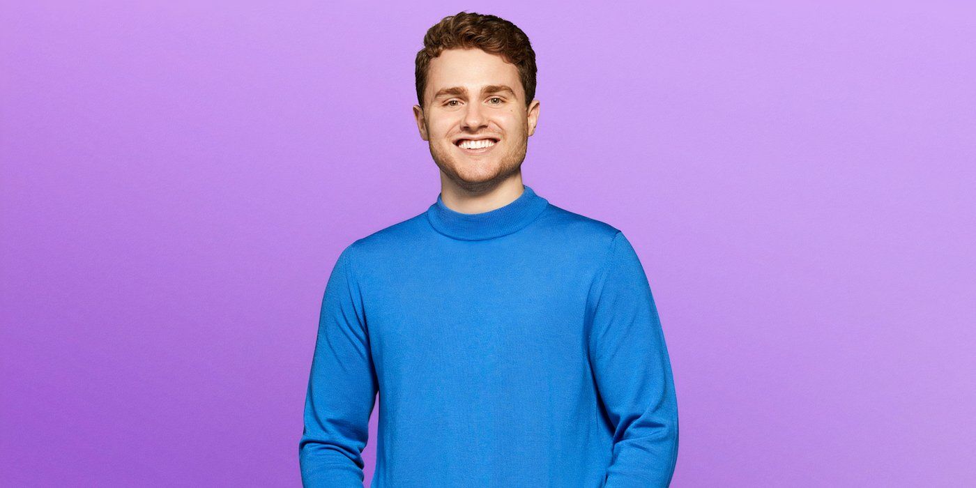 Love Is Blind season 8 Alex Brown smiling during a promo photo with a purple background