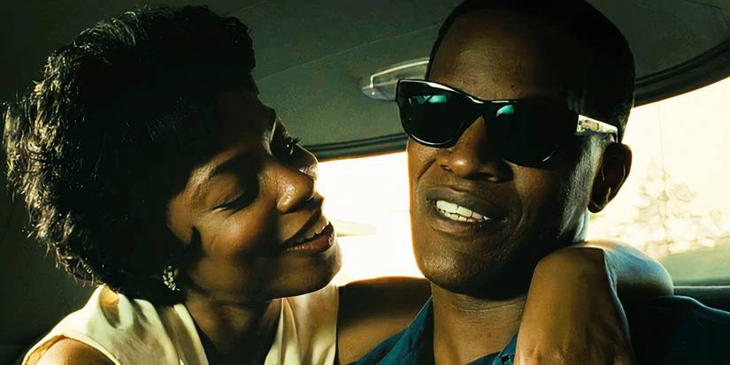  Aunjanue Ellis-Taylor and Jamie Foxx in the back of a car in Ray