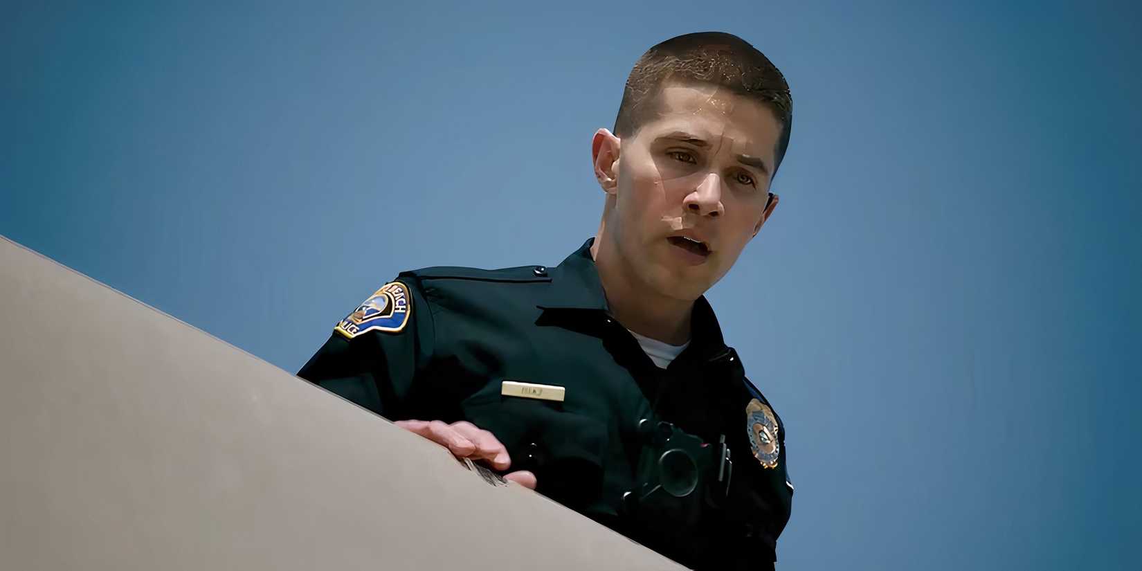 Brandon Larracuente as Alex Diaz looking worried over a rooftop in On Call
