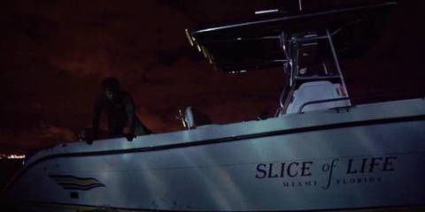 Dexter dumping a body from his boat the Slice of Life in Dexter