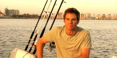 Dexter Morgan smiling on his boat in Dexter