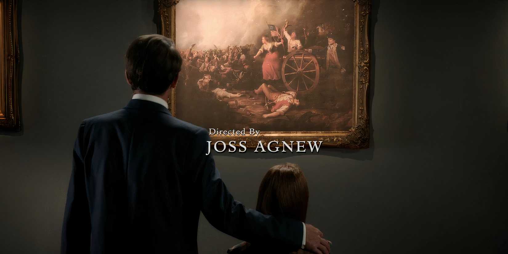 Frank and Brianna looking at a painting in Outlander
