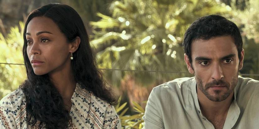 Zoe Saldana and Eugenio Mastrandrea frowning in Netflix's From Scratch