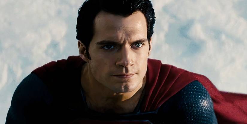 Henry Cavill as Superman looking up from the snow