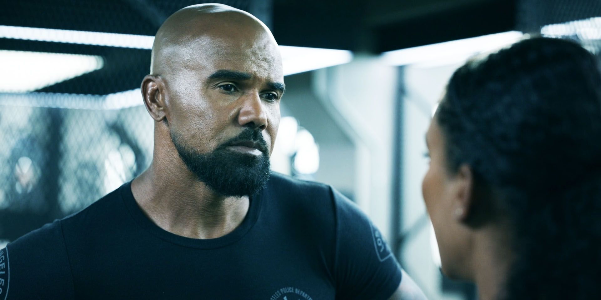 Hondo (Shemar Moore) talking to a member of his team in season 8, episode 8