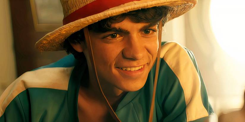 inaki godoy as monkey d luffy smiling while leaning forward in one piece season 1